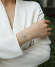 Moissanit Tennis Armband mit 0.9 Karat VVS1 Reinheit und D Farbgrad aus rhodiniertem 925 Silber (18 cm)